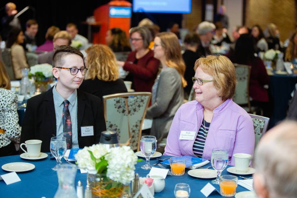 Theo Randall speaking with a donor at Scholarship Dinner 2019